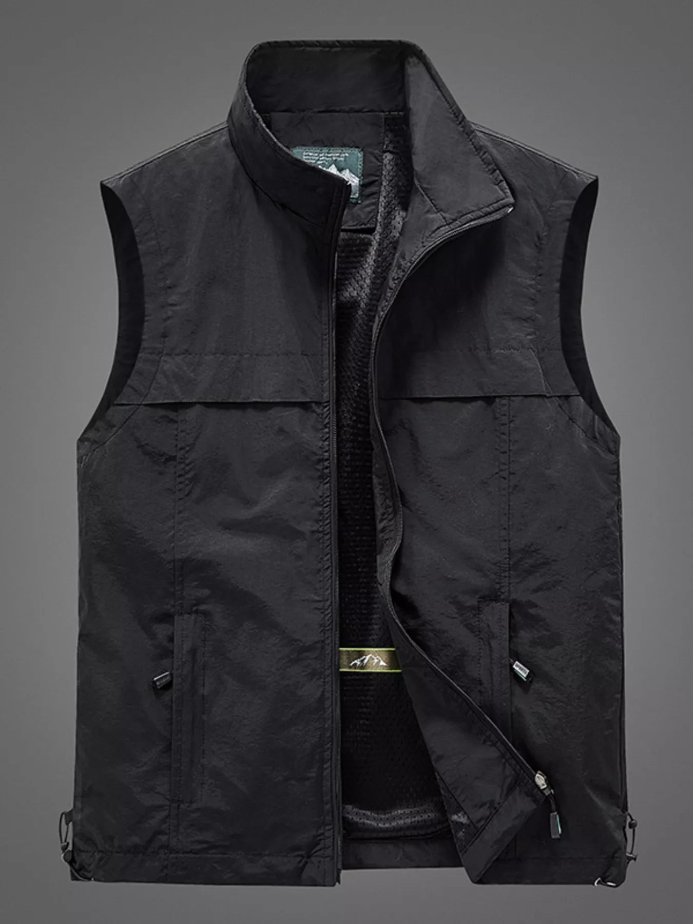 Black men's plus size zip-up vest from Trendsi, shown with front zipper, sleeveless design, and casual fit.