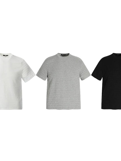 Black men's round neck short sleeve T-shirt by Trendsi, showcasing a comfortable fit and simple crew neckline.