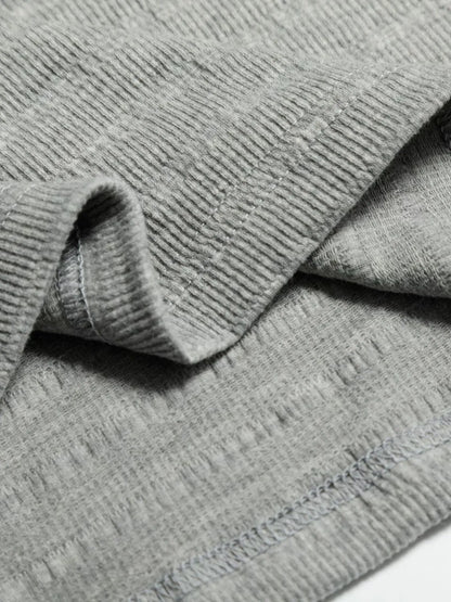 Black men's round neck short sleeve T-shirt from Trendsi, showcasing a close-up of the classic casual tee.