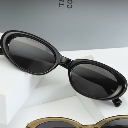 Trendsi UV protection oval sunglasses with dark tinted lenses and sleek black frame, stylish eyewear for sun protection