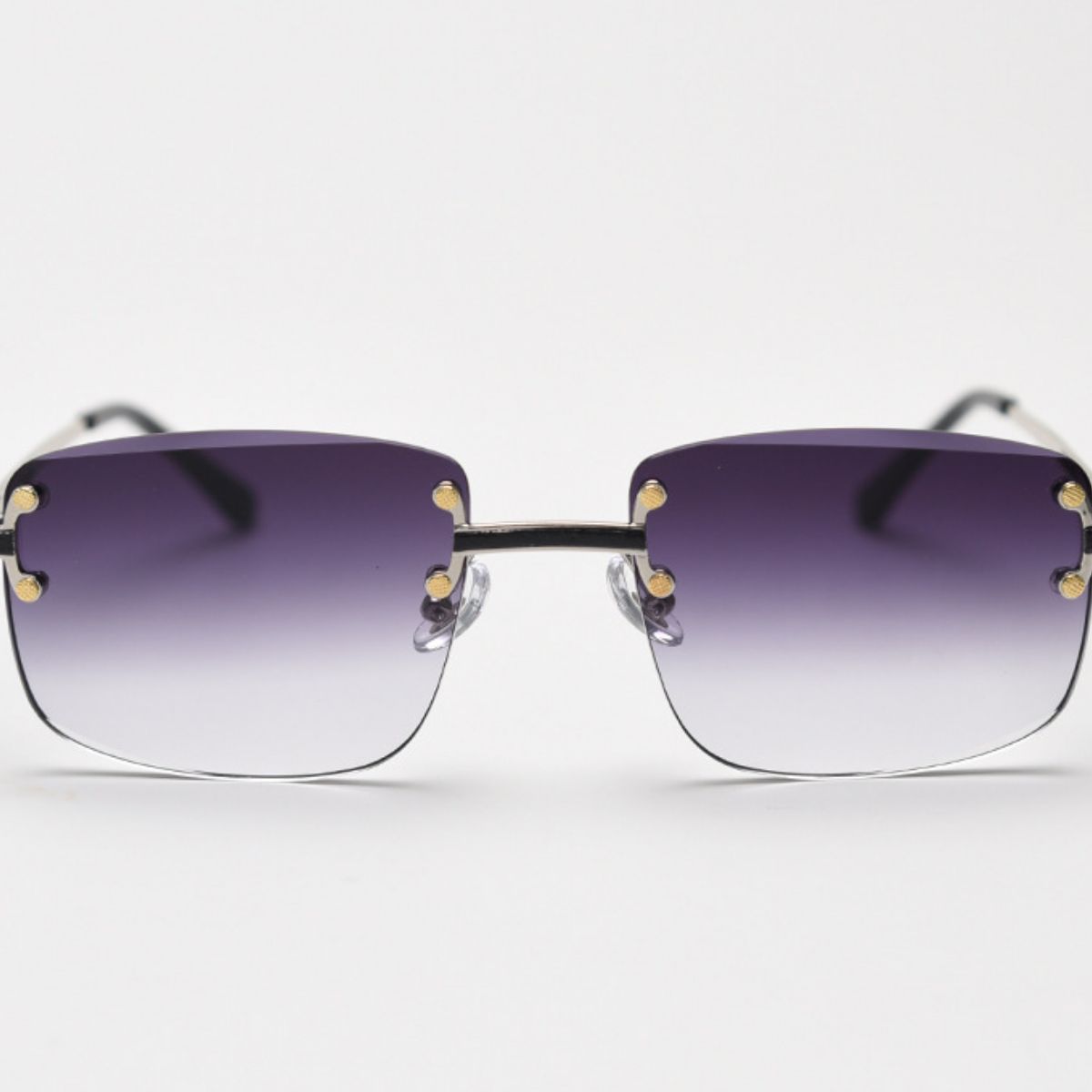 Rimless gradient tinted sunglasses by Trendsi with sleek frame and stylish tinted lenses for a modern look.