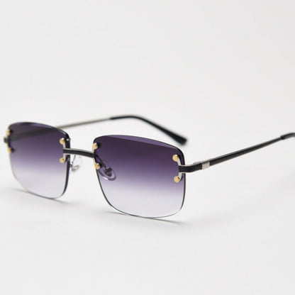 Rimless gradient tinted sunglasses by Trendsi with sleek, modern design and gradient lenses in a natural outdoor setting