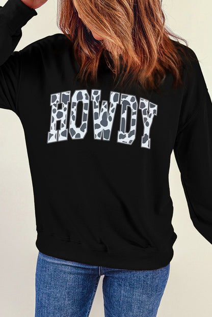 Black Trendsi casual comfort sweatshirt with a round neck, long sleeves, and a Howdy graphic for everyday wear.