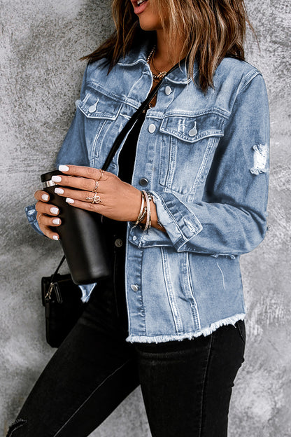 Black distressed raw hem denim jacket with button closure from Trendsi, featuring a casual, stylish fit and classic denim texture.