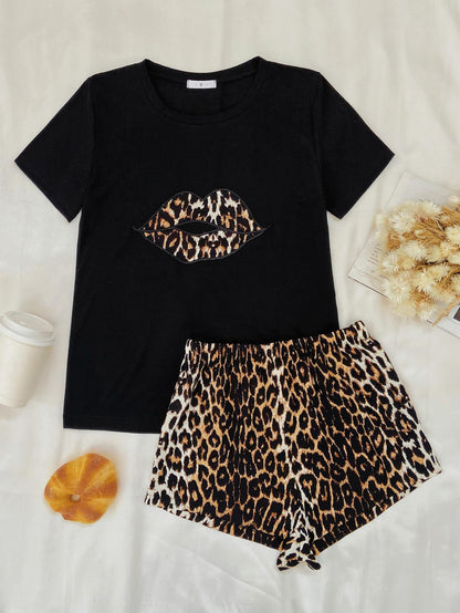 Black leopard print lounge set from Trendsi featuring comfortable, stylish loungewear for relaxed, chic casual wear.