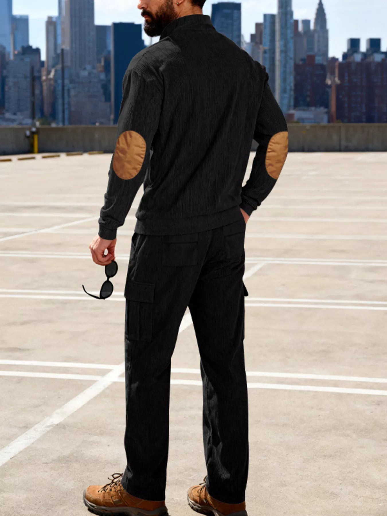 Plus size men's casual button detail top and pants set from Trendsi in black, featuring a comfortable, relaxed fit.