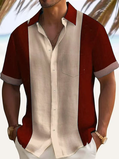 Men's plus size color block short sleeve shirt by Trendsi, featuring black, gray, and white panels, casual and stylish men's apparel.