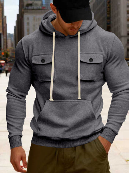 Men's black full-size fleece hoodie with dual chest pockets, plus size, by Trendsi, showing front view of cozy, comfortable fleece jacket.