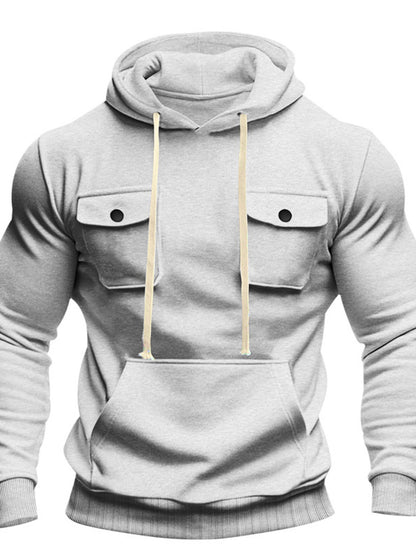 Men's black full-size fleece hoodie with dual chest pockets, plus size, from Trendsi, featuring a cozy, relaxed fit and front pocket design.