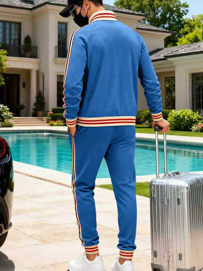 Men's plus size striped zip-up outerwear and pants by Trendsi, black full-size men's clothing set with bold stripe design.