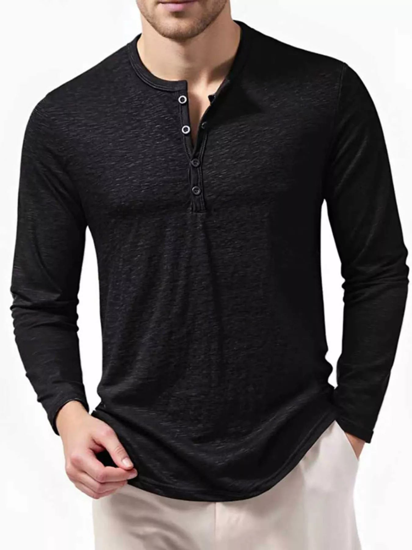 Men's black long sleeve Henley T-shirt from Trendsi, showcasing a fitted style with buttoned neckline and soft fabric.