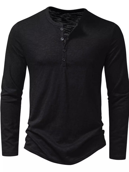 Black men's long sleeve Henley T-shirt by Trendsi, featuring a buttoned placket and comfortable fit, shown on a model.
