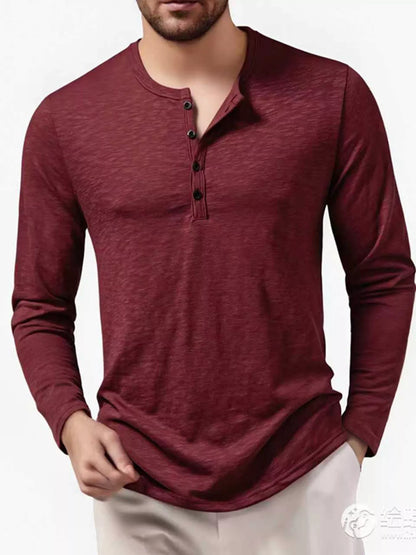 Men's black long sleeve Henley T-shirt by Trendsi, shown flat with buttoned collar and ribbed cuffs.