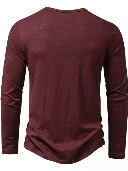Black men's long sleeve Henley T-shirt by Trendsi, featuring a crew neck and button placket, made from soft, comfortable fabric.