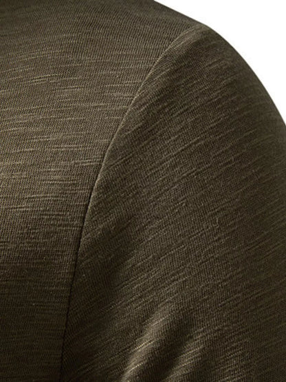Black men's long sleeve Henley T-shirt by Trendsi, featuring a round neckline and button placket, casual and comfortable fit.