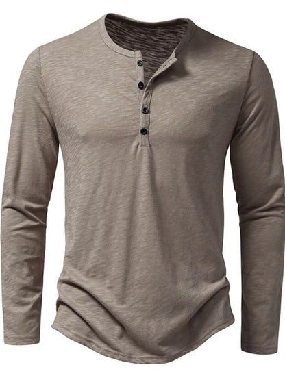 Men's black long sleeve Henley T-shirt by Trendsi, featuring a classic buttoned neckline and comfortable fit.
