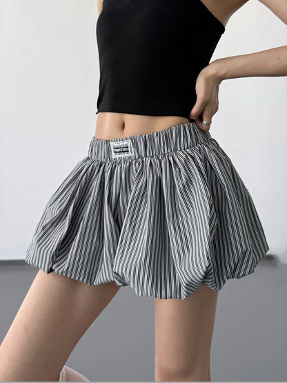 Striped bubble hem casual shorts by Trendsi, featuring a relaxed fit with colorful horizontal stripes and a playful bubble hem detail.