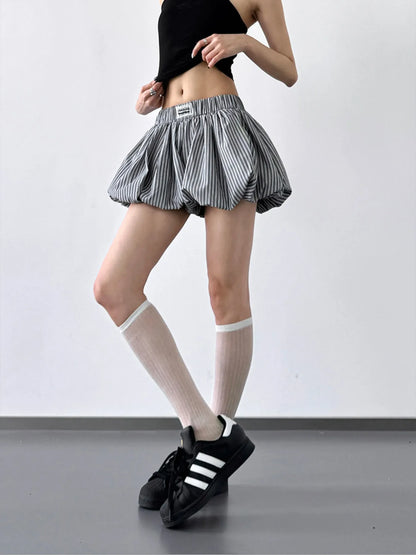Striped bubble hem casual shorts by Trendsi featuring a relaxed fit, vibrant stripes, and a playful bubble hem design.
