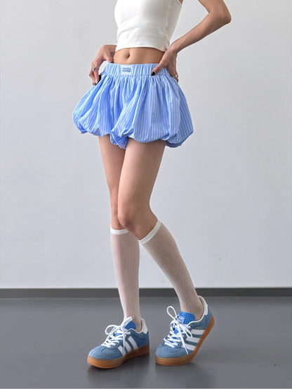 Striped bubble hem casual shorts by Trendsi featuring a relaxed fit and playful striped pattern, perfect for casual summer wear.