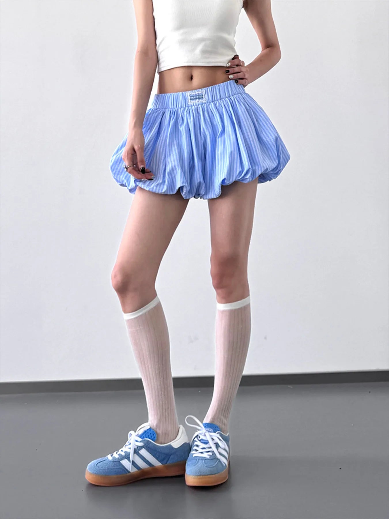 Striped bubble hem casual shorts by Trendsi featuring a relaxed fit and playful design, perfect for casual summer wear.