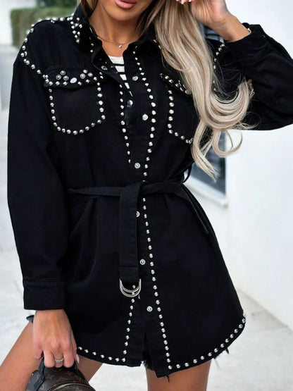 Black studded snap-down long sleeve denim shacket by Trendsi, featuring button closure and distressed details.