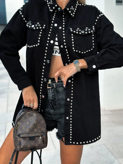 Black studded snap-down long sleeve denim shacket from Trendsi, featuring a classic collar and button closure with studded details.