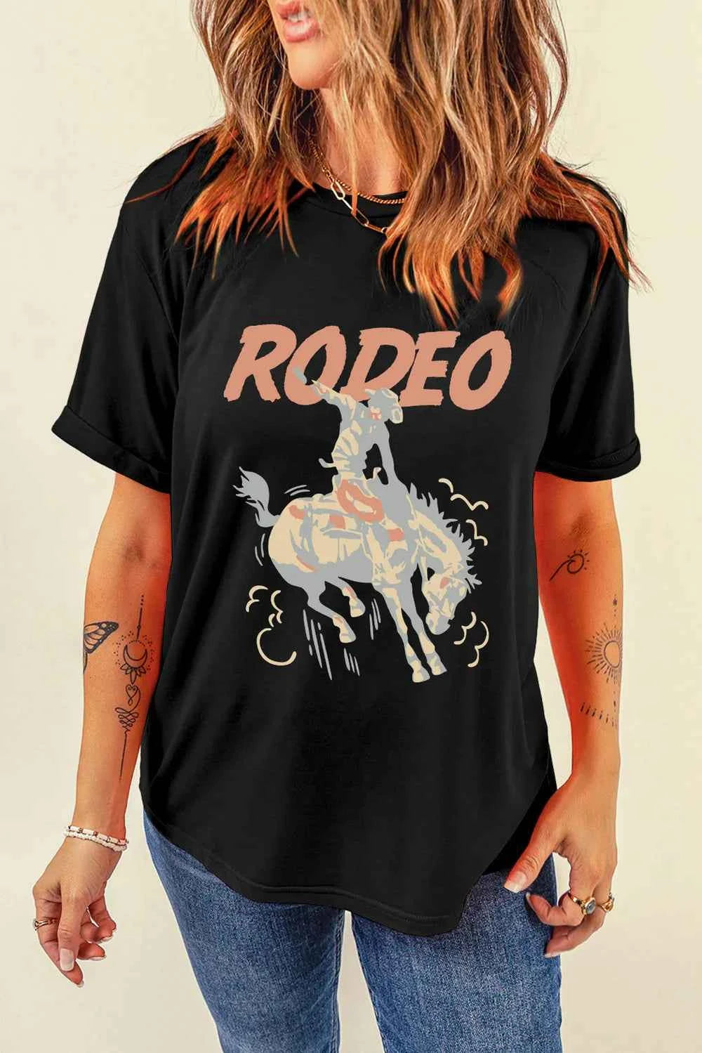 Black graphic round neck T-shirt by Trendsi, featuring stylish design and comfortable fit for everyday wear.