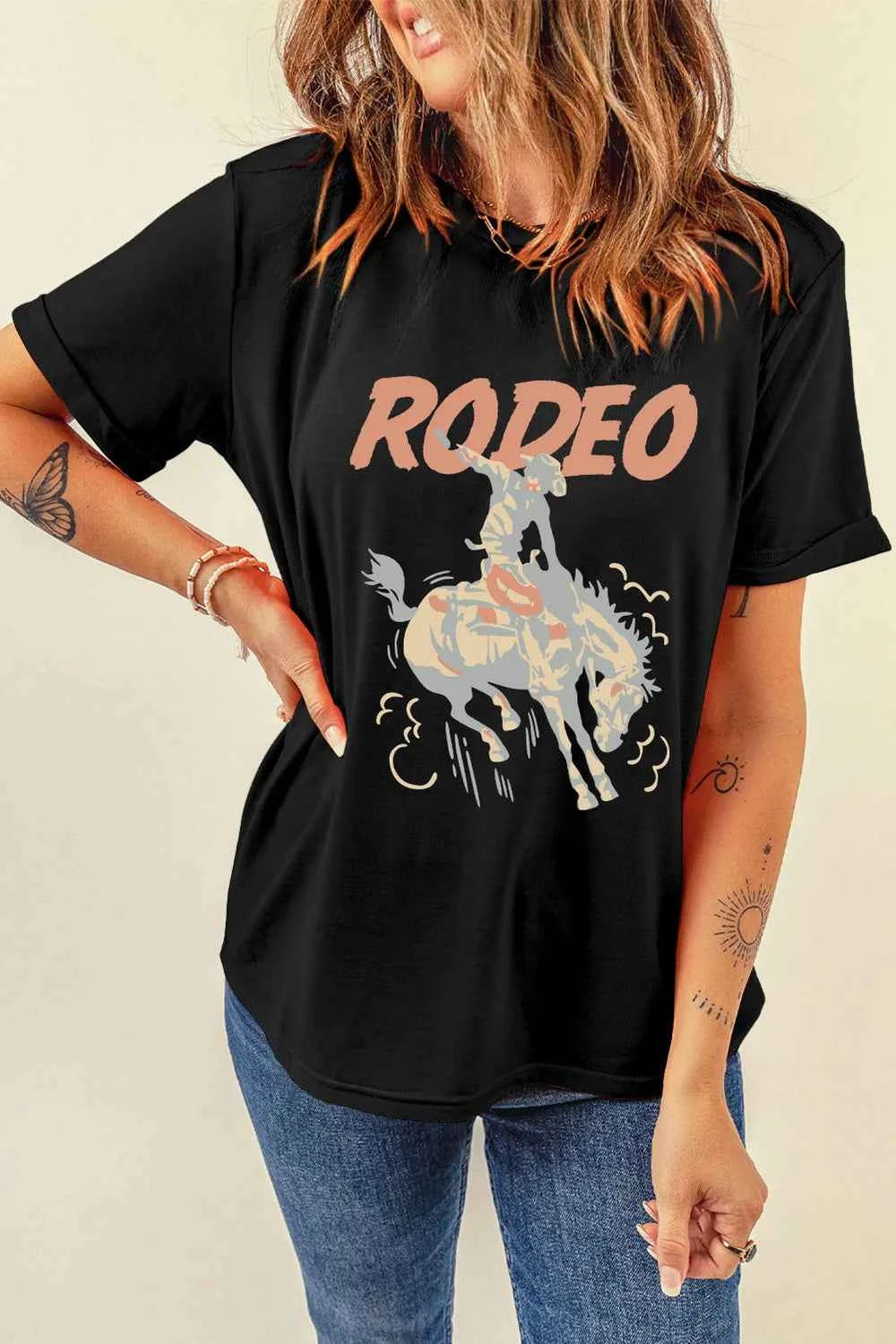 Black stylish graphic round neck T-shirt by Trendsi, featuring a comfortable fit and casual everyday wear.