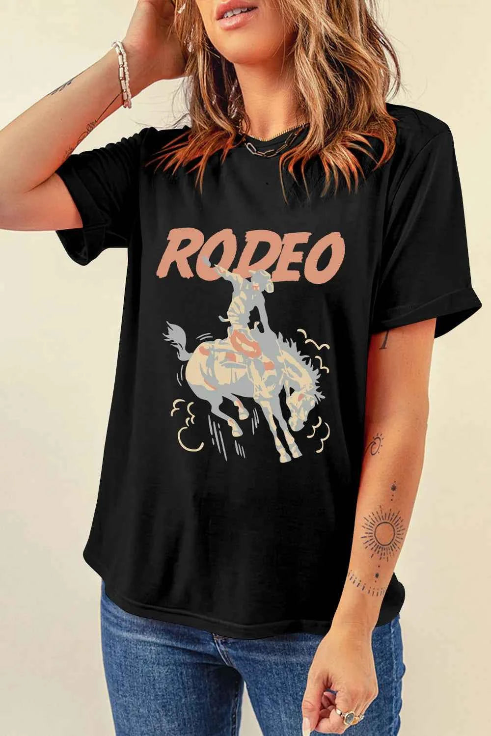 Black stylish graphic round neck T-shirt by Trendsi, featuring a casual fit and comfortable fabric for everyday wear.
