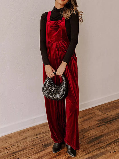 Velvet wide-leg overalls by Trendsi featuring a relaxed fit, deep pockets, and adjustable straps in soft velvet fabric.