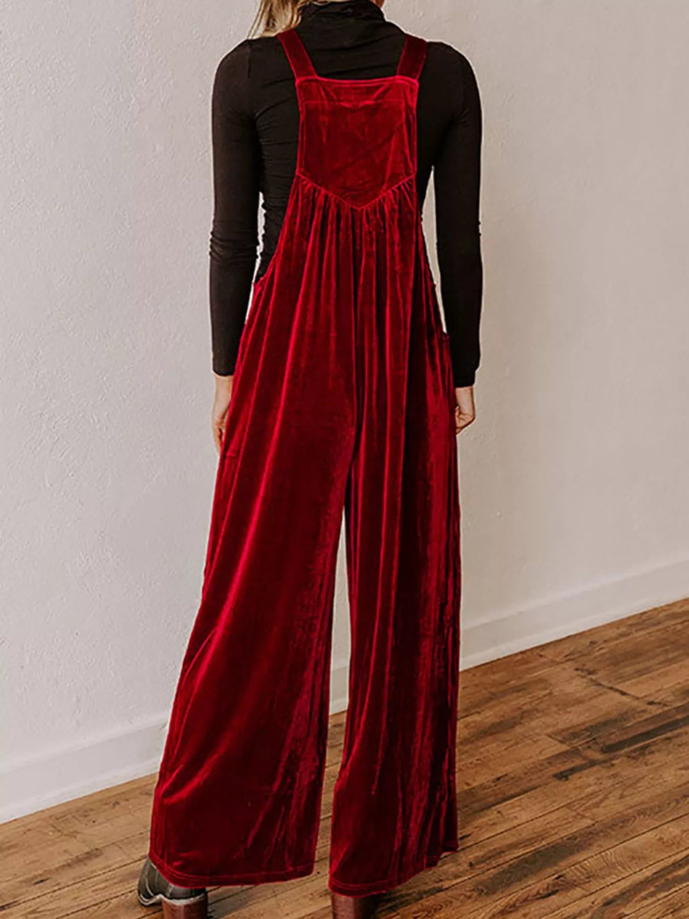 Velvet wide-leg overalls by Trendsi, featuring a soft fabric and relaxed fit, displayed on a hanger against a neutral background.