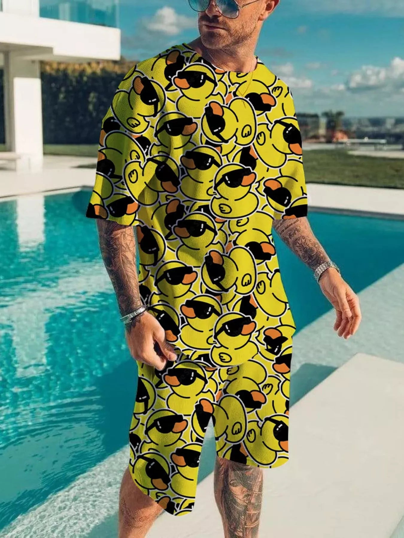 Plus size men's black printed short sleeve tee and matching shorts from Trendsi, casual summer outfit with bold graphic design.