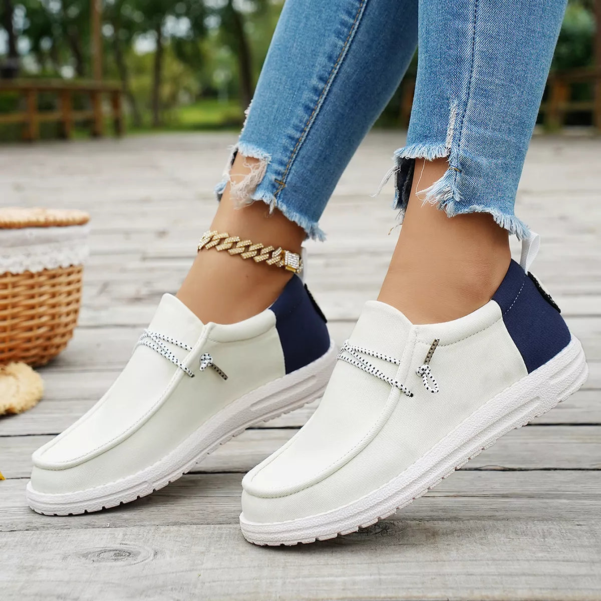 Round toe slip-on shoes by Trendsi featuring a sleek design and comfortable fit, shown in a neutral color.