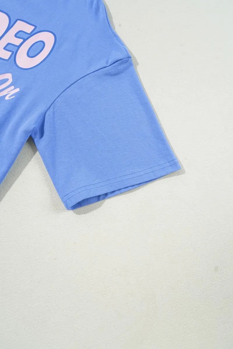 Blue and purple graphic round neck T-shirt by Trendsi, made of soft fabric, perfect for casual everyday wear.