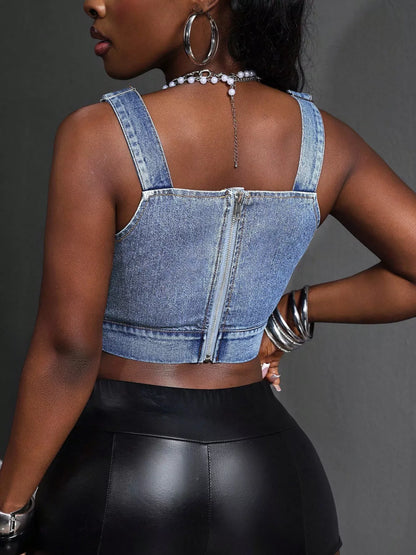 Blue cropped denim top with adjustable straps by Trendsi, shown on a mannequin. Casual, trendy women’s fashion piece.