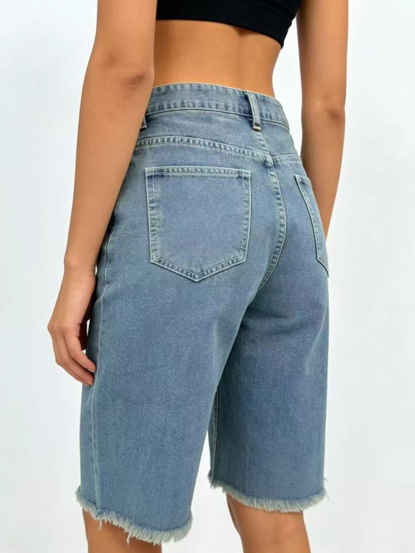 Blue Trendsi frayed hem relaxed fit denim shorts with distressed detailing and casual style, perfect for summer wear.