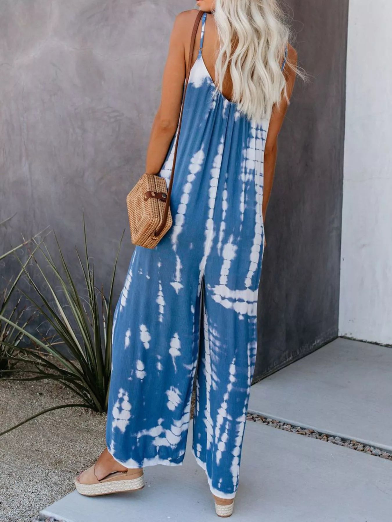 Plus size tie-dye wide-leg jumpsuit by Trendsi, full size blue jumpsuit with relaxed fit and stylish design.