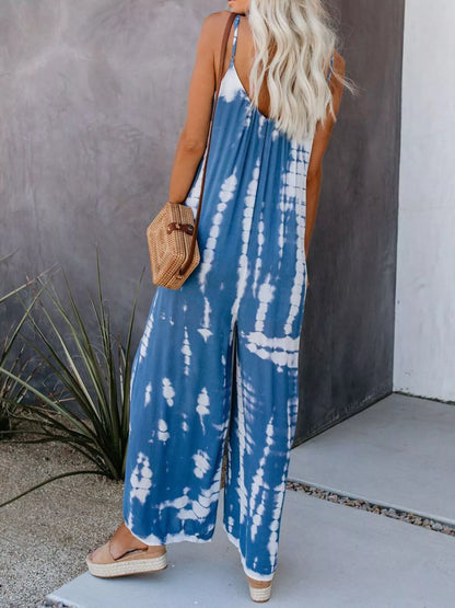 Plus size tie-dye wide-leg jumpsuit by Trendsi, full size blue jumpsuit with relaxed fit and stylish design.