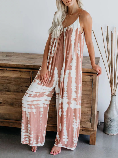 Plus size blue tie-dye wide-leg jumpsuit by Trendsi, full-length view showcasing relaxed fit and vibrant pattern.