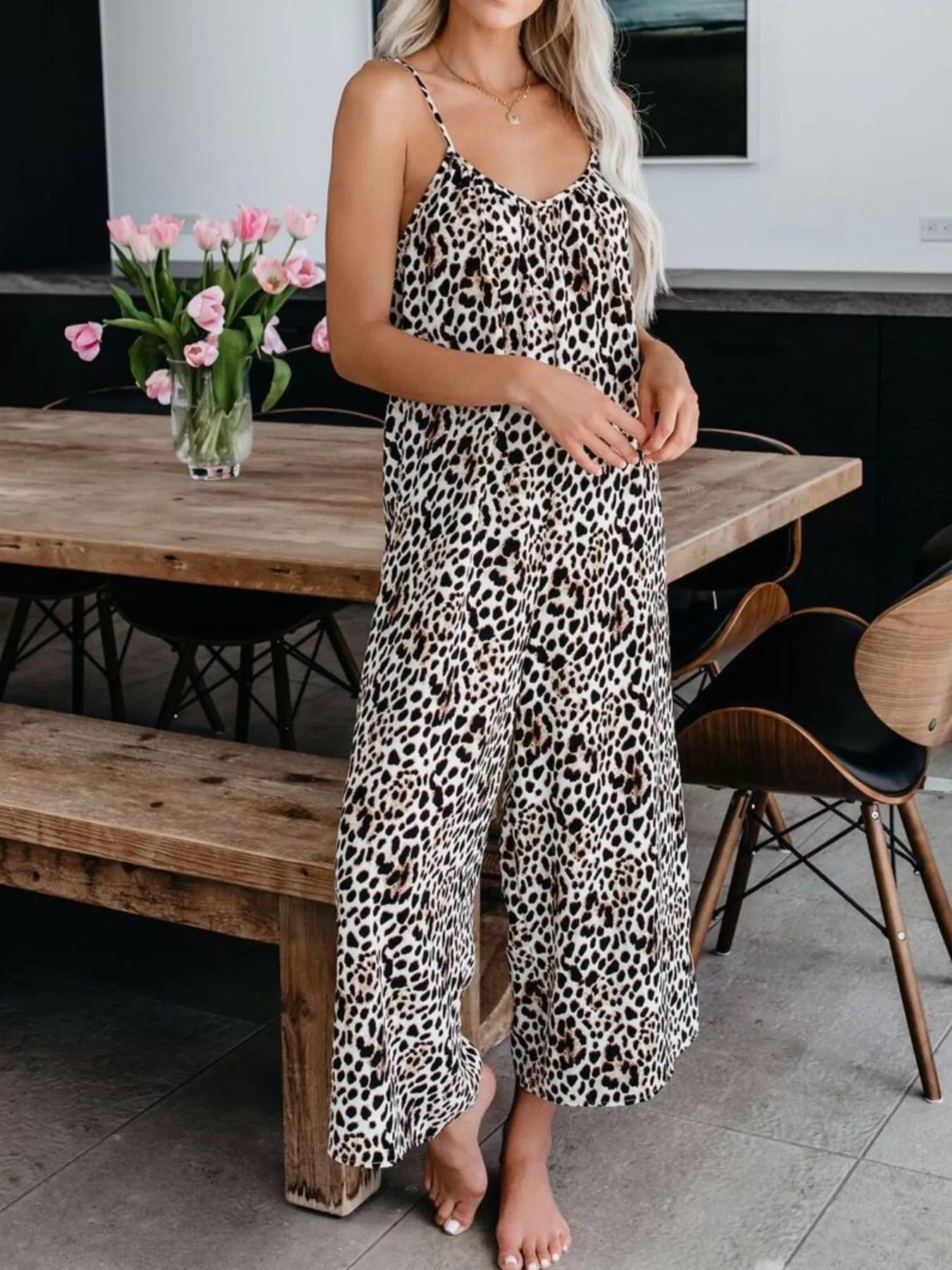 Plus size tie-dye wide leg jumpsuit from Trendsi, featuring vibrant blue colors and a full-length, relaxed fit.