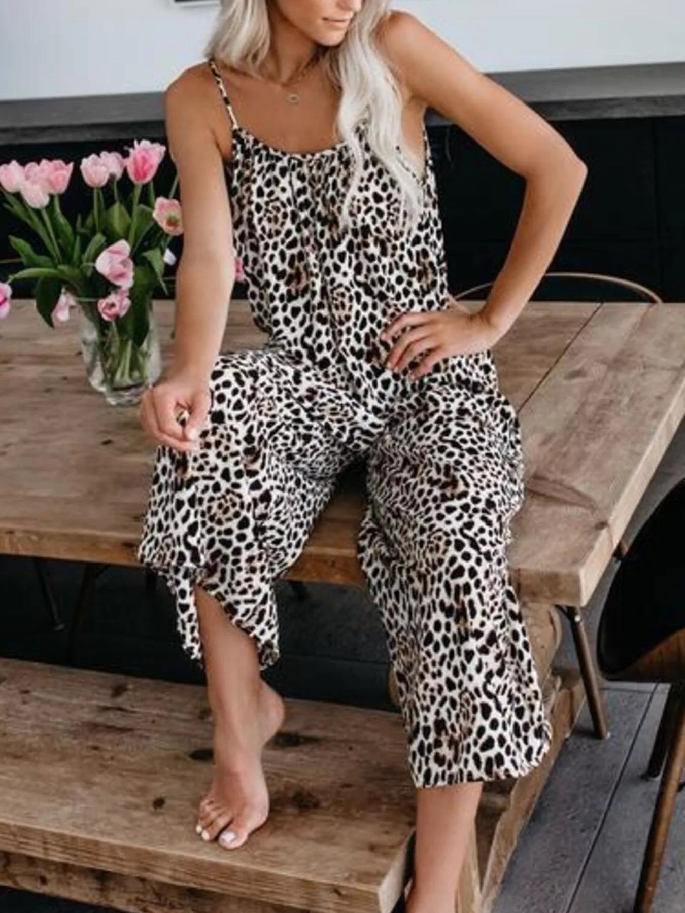 Plus size blue tie-dye wide-leg jumpsuit by Trendsi, full-length view showing relaxed fit and vibrant pattern.