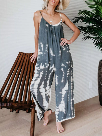 Plus size blue tie-dye wide-leg jumpsuit from Trendsi, full length with relaxed fit and stylish casual design.