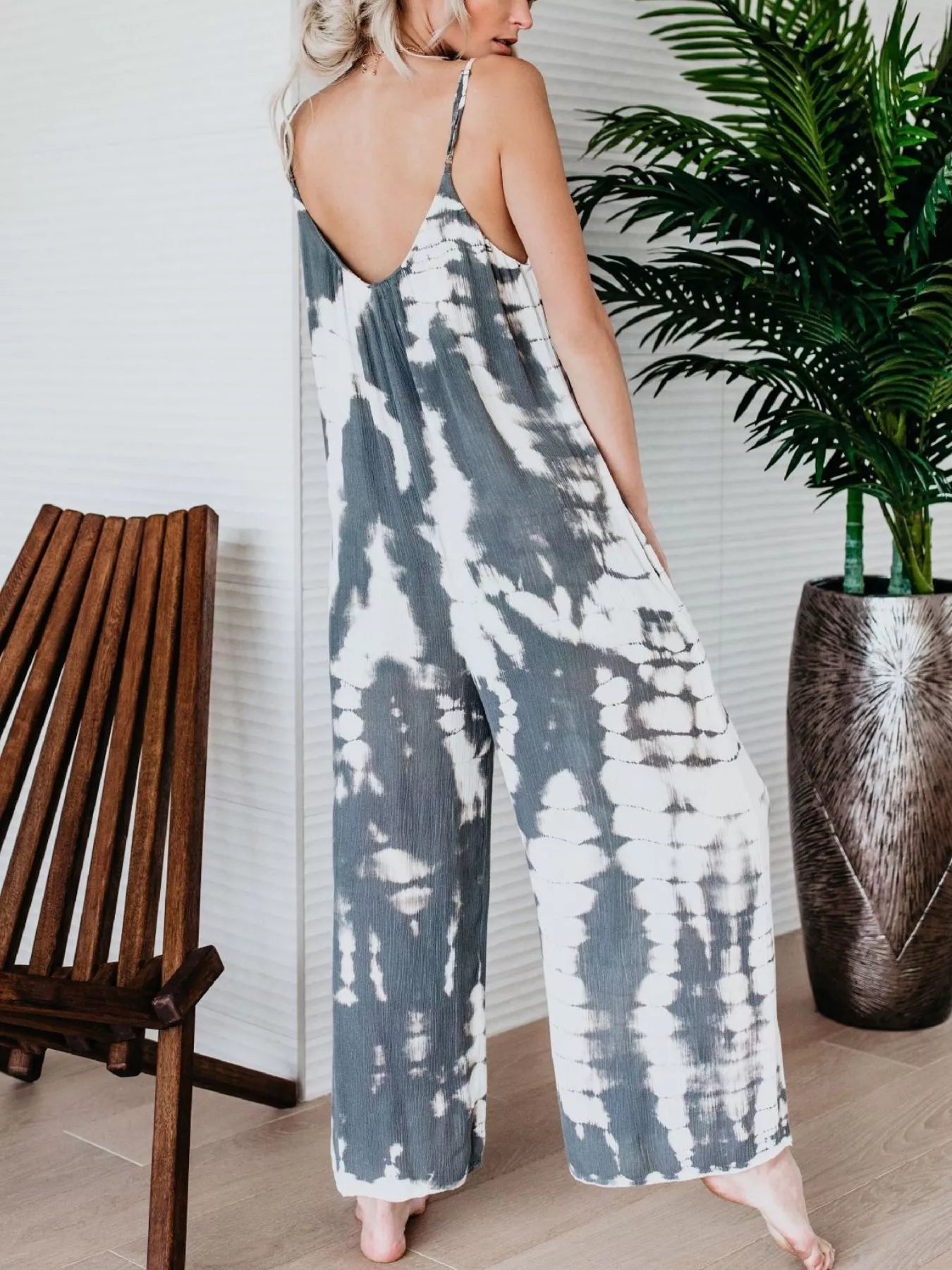 Plus size blue tie-dye wide leg jumpsuit from Trendsi, full-length casual jumpsuit with relaxed fit and stylish pattern.