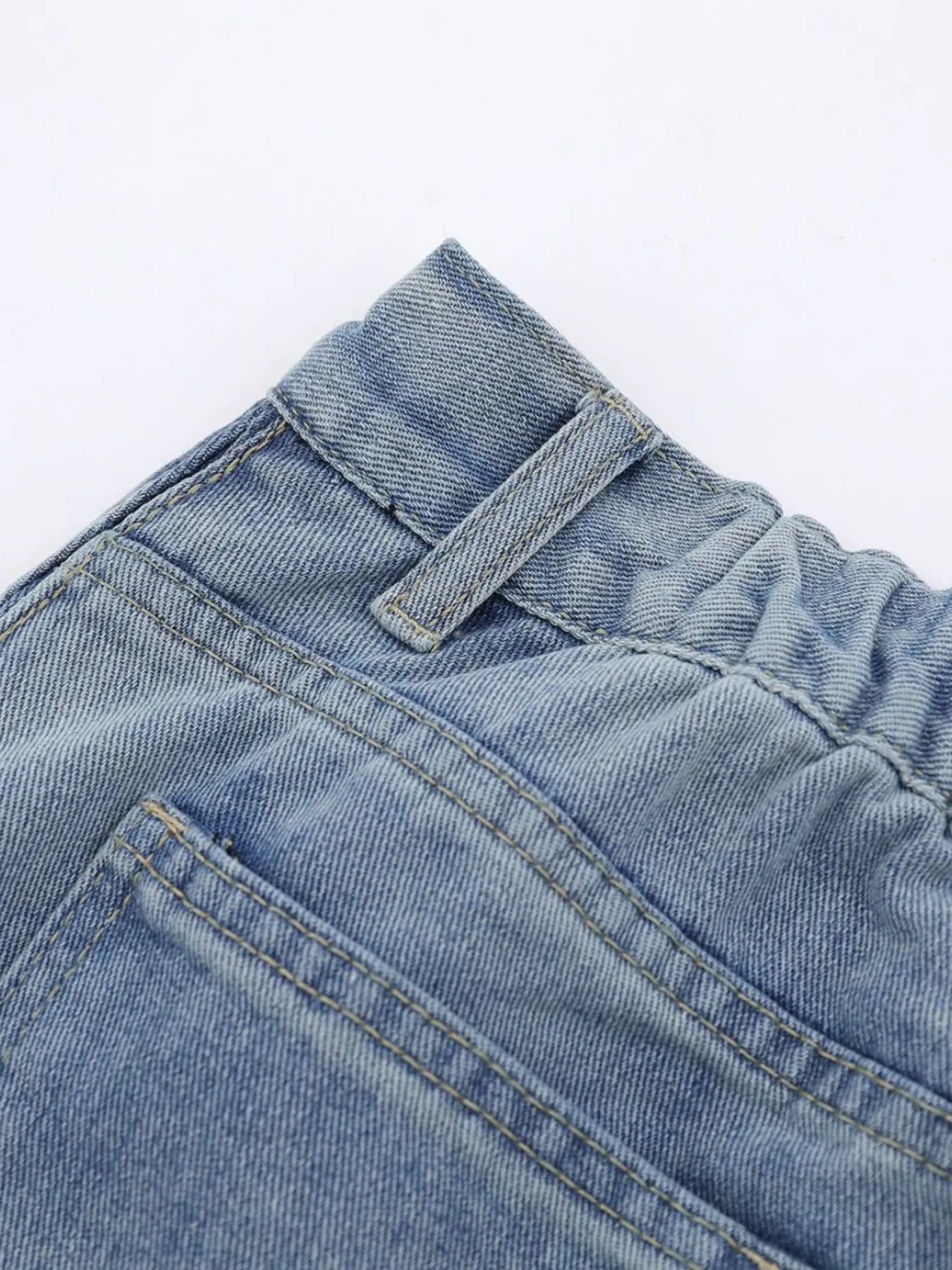 Men's blue high-waist wide-leg relaxed fit jeans by Trendsi, showing the full length and classic denim design.