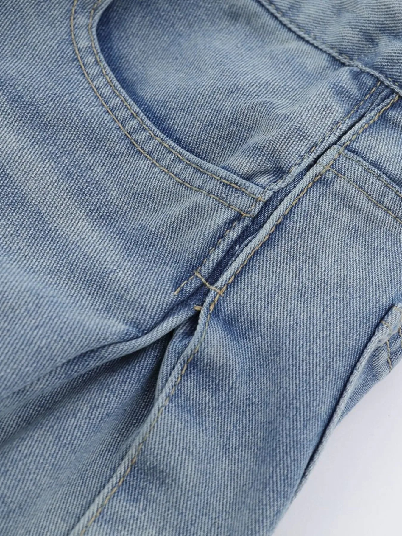 Men's blue high-waist wide-leg relaxed fit jeans by Trendsi, shown with a focus on the waistband and relaxed leg silhouette.