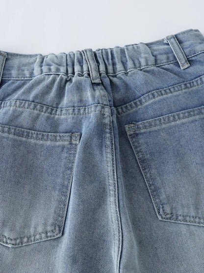 Men's high-waist wide-leg relaxed fit jeans in blue denim, branded Trendsi, shown on a model.
