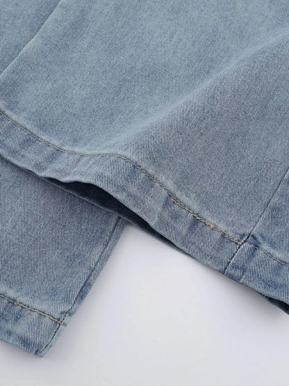 Men's high-waist wide-leg relaxed fit jeans in blue, styled by Trendsi, with visible details of the denim fabric and relaxed silhouette.