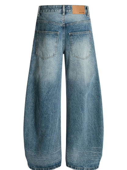 Men's wide-leg vintage wash jeans by Trendsi, shown in blue denim with a relaxed fit and classic five-pocket design.