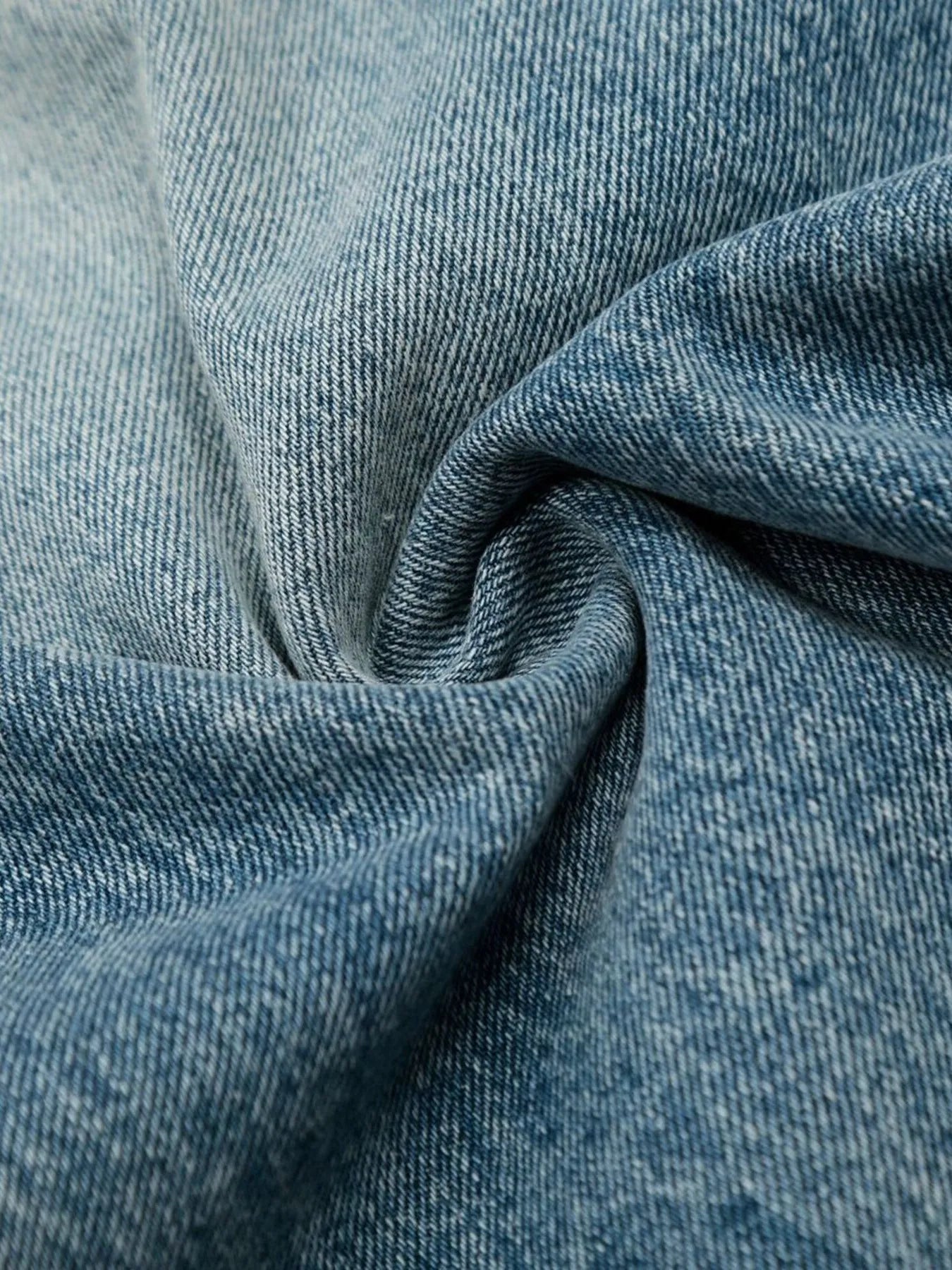 Men's wide-leg vintage wash jeans from Trendsi, featuring relaxed fit, distressed details, and classic denim style.
