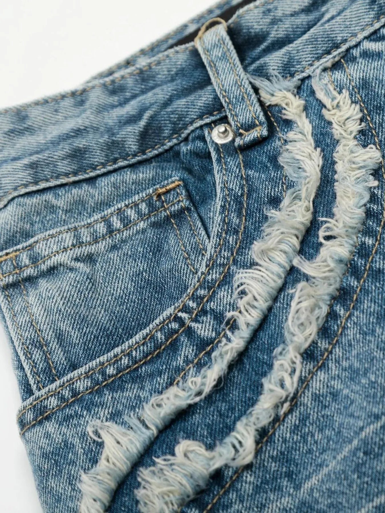 Men's wide-leg vintage wash jeans from Trendsi, showing the relaxed fit and faded denim texture in a front view.